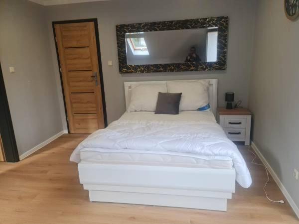 Na Lesnym Wzgorzu Apartment *